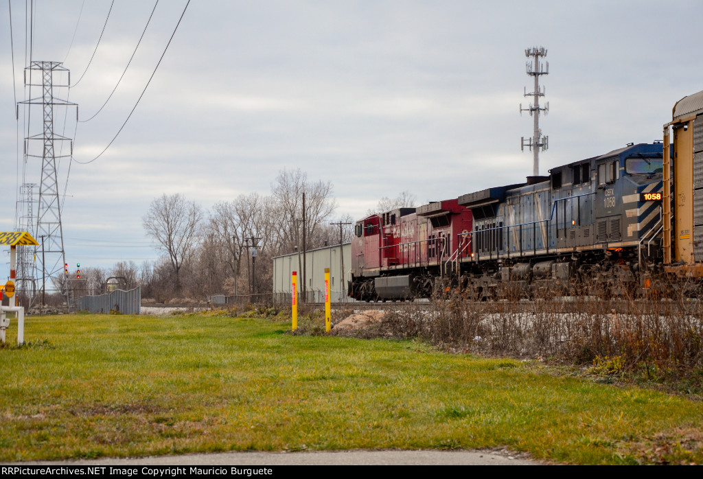 CP + CEFX AC44CW Locomotives leading a train